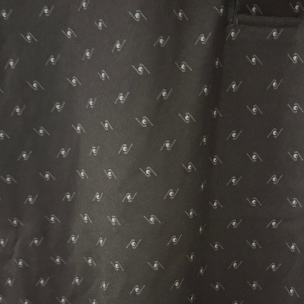 Greg Norman Collection Black Golf Polo with Subtle Pattern - Picture 10 of 11